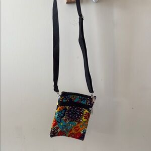 Black Crossbody Bag with Adjustable Strap and Compact Design